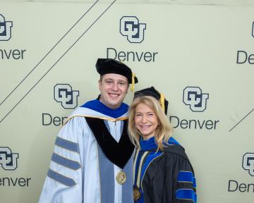 Regent Jack Kroll (left) and Chancellor Michelle Marks (right)