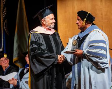 Regent Gallegos with CU Boulder honoree