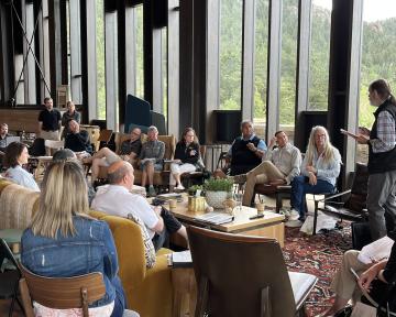 CU Regents and System Administration listen to Vice President Mike Lightner moderate a discussion during the summer 2023 retreat.