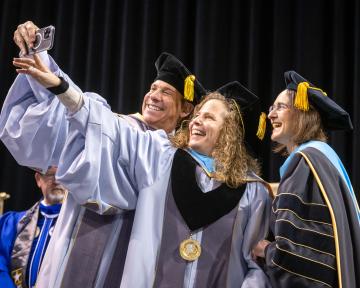 (Left to Right) Regents Montera and Spiegel take a selfie with UCCS Chancellor Sobanet