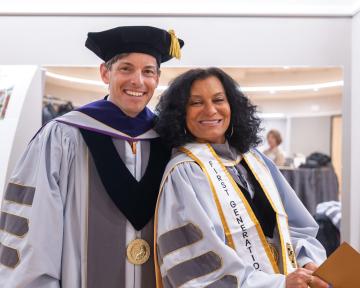 (Left) Regent Elliott Hood smiles with (Right) Regent Wanda James